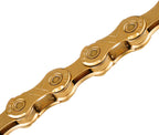 KMC Cadena X11EL ExtraLight Titanio Oro