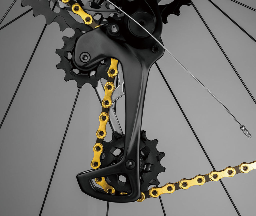KMC Cadena X11EL ExtraLight Titanio Oro