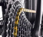 KMC Cadena X11EL ExtraLight Titanio Oro
