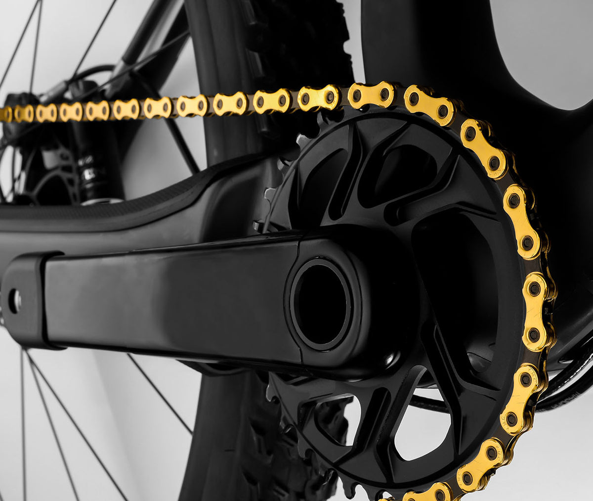 KMC Cadena X11EL ExtraLight Titanio Oro